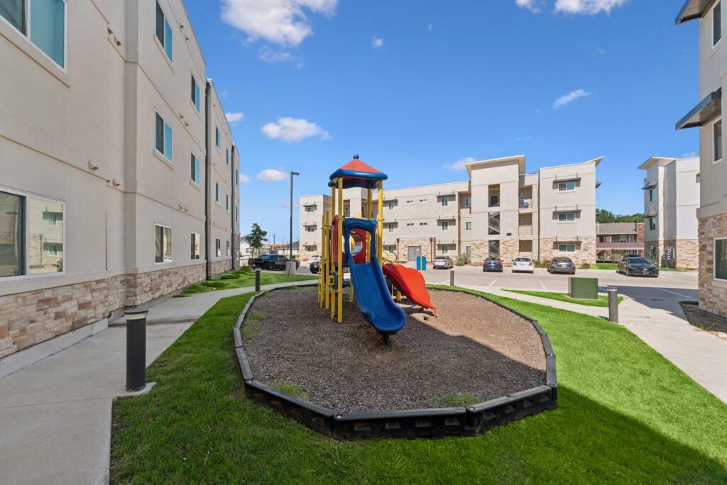 ensign apartments playground view
